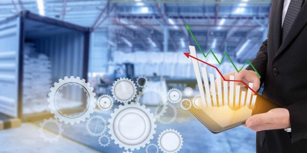 midsection-businessman-holding-digital-tablet-with-icons-factory (1)